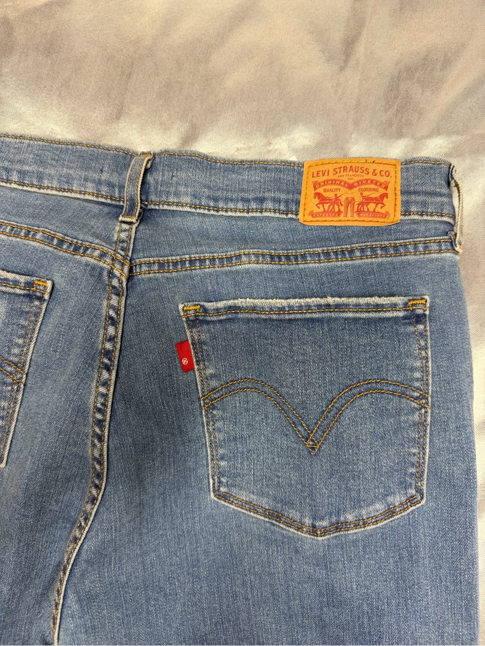 Levi's Women’s Light Blue High-Rise Denim Jeans with Tan Leather Patch